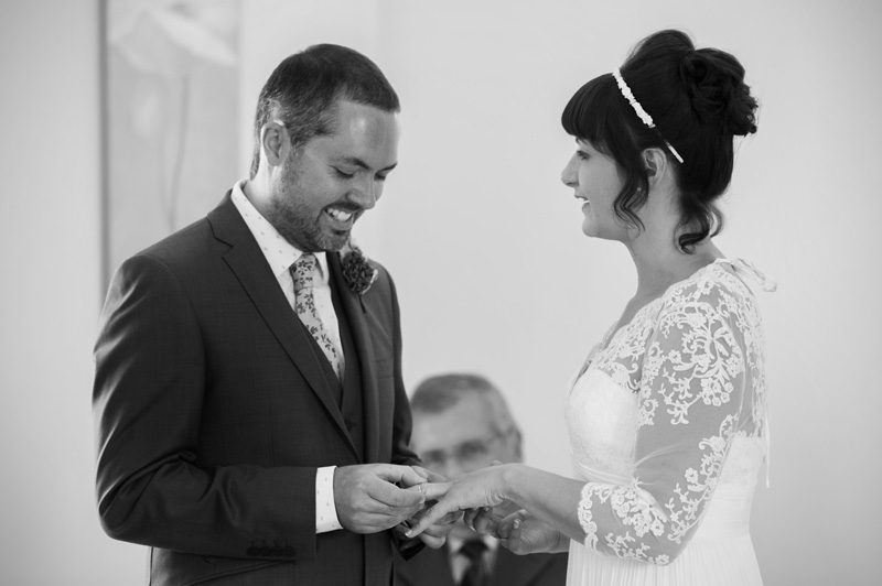Exchanging rings at Leeford place wedding by Sussex wedding photographer James Robertshaw