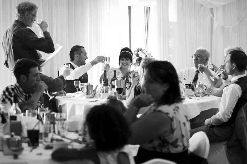 Toasts at Leeford place by Sussex wedding photographer James Robertshaw