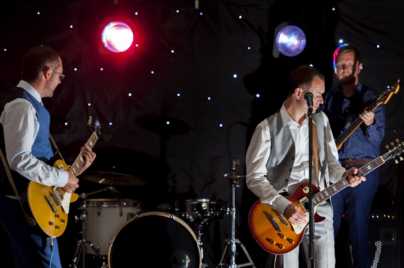 Groom playing in band at Leeford place wedding by Sussex wedding photographer James Robertshaw 19