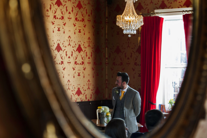 Groom waiting for bride at the Bell Ticehurst wedding by Sussex Wedding photographer James Robertshaw