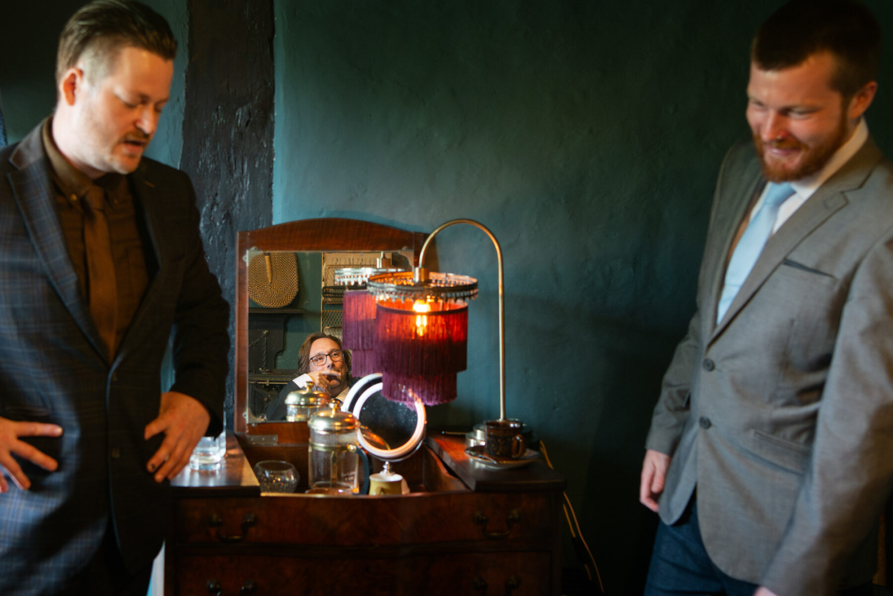 Groom in mirror at The Pildrim's Rest
