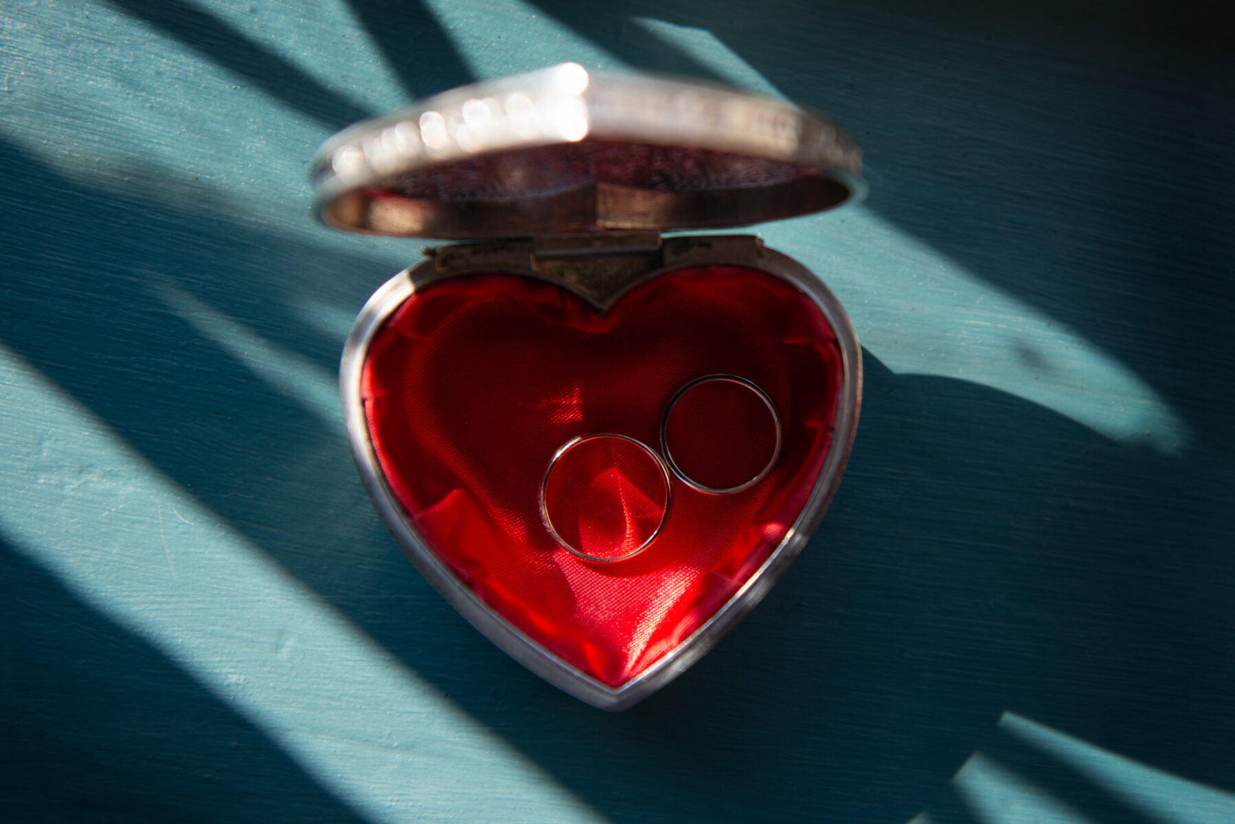 Wedding rings in a heart shaped box