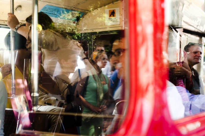 Wedding party getting on London bus by London reportage wedding photographer James Robertshaw