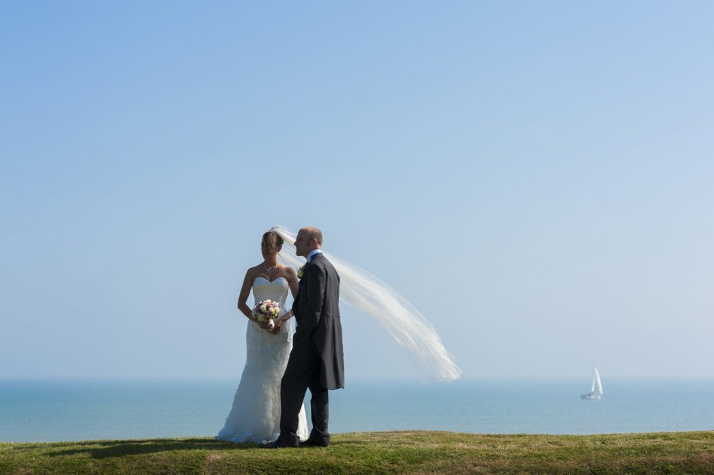 Couple at the Cooden Beach Hotel by Sussex wedding photographer James Robertshaw