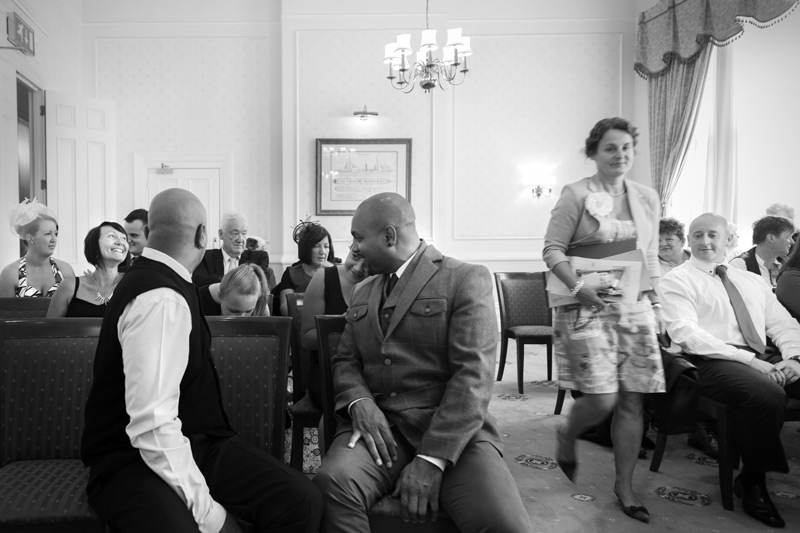 Groom and guests at The Grand Eastbourne wedding by Sussex wedding photographer James Robertshaw