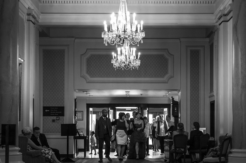 Wedding party in lobby at The Grand Eastbourne wedding by Sussex wedding photographer James Robertshaw