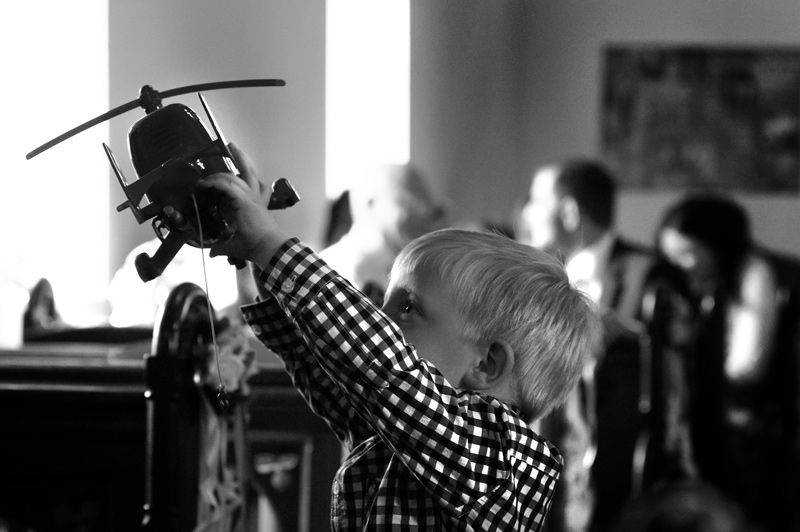 Child playing in church before wedding 