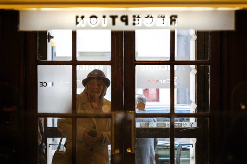 Wedding guest coming into Camden Town Hall