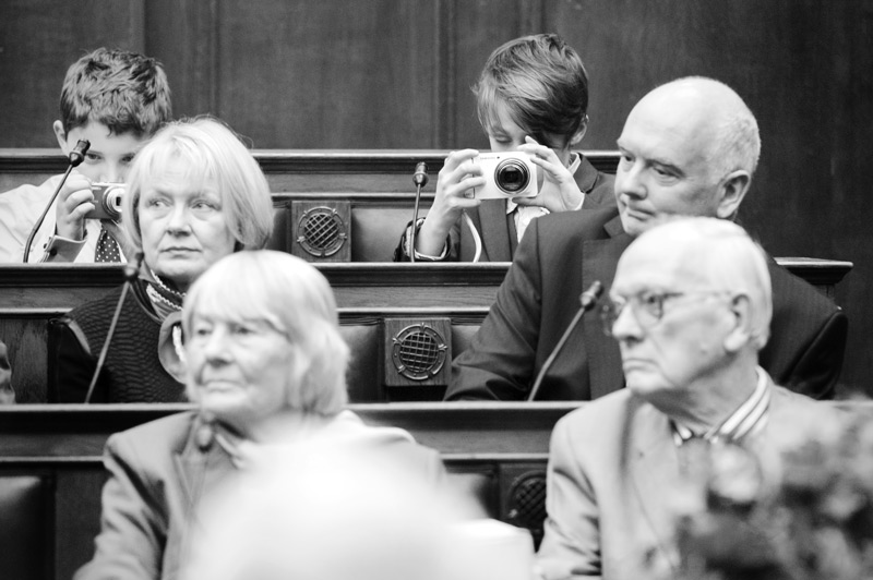 Kids taking pictures during Camden Town Hall wedding