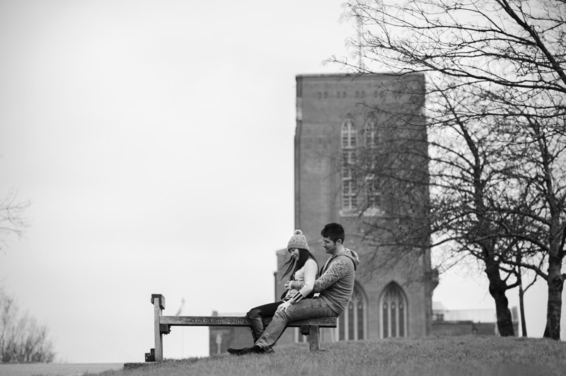 Couple sitting on a bench - natural couple photography by James Robertshaw
