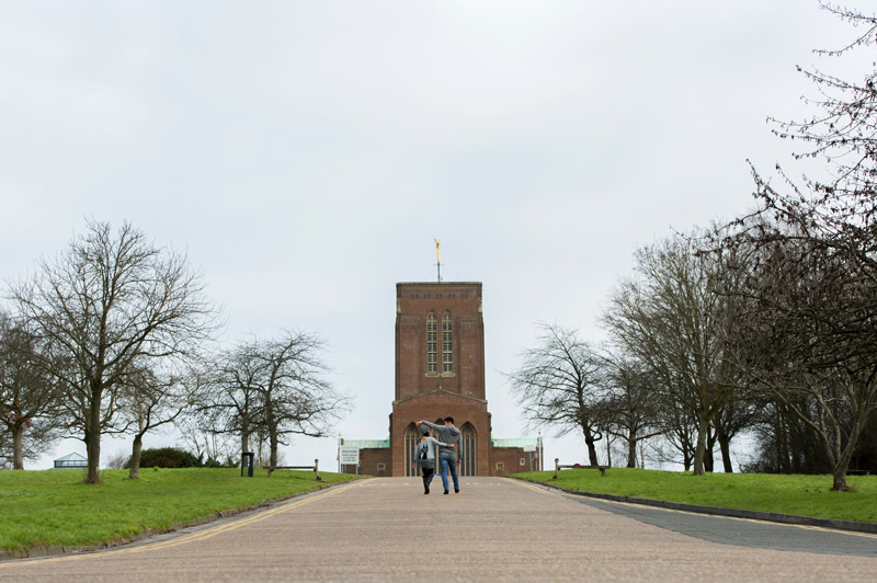 Couple walking away into the distance - natural couple photography by James Robertshaw