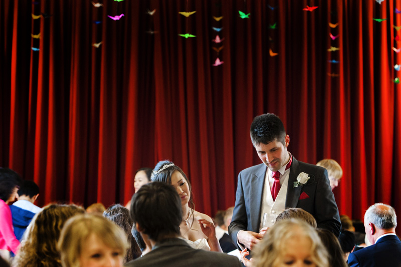 Bride and Groom talking to guests at Field Place wedding