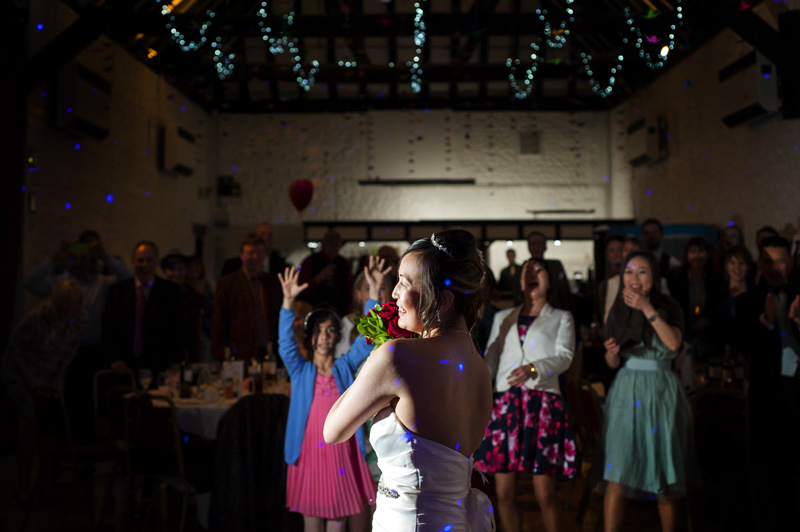 Bride with bouquet at Field place wedding