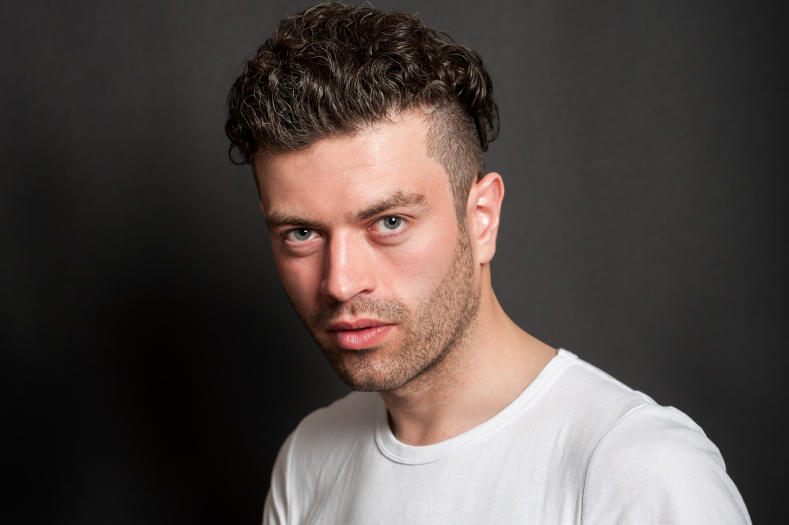 Studio portrait of male model by Sussex portrait photographer James Robertshaw