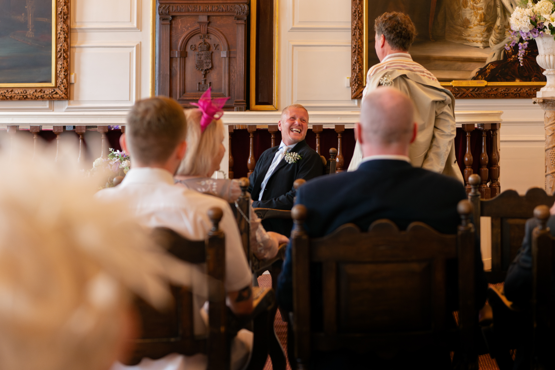 Groom smiling before Windor Guildhall wedding