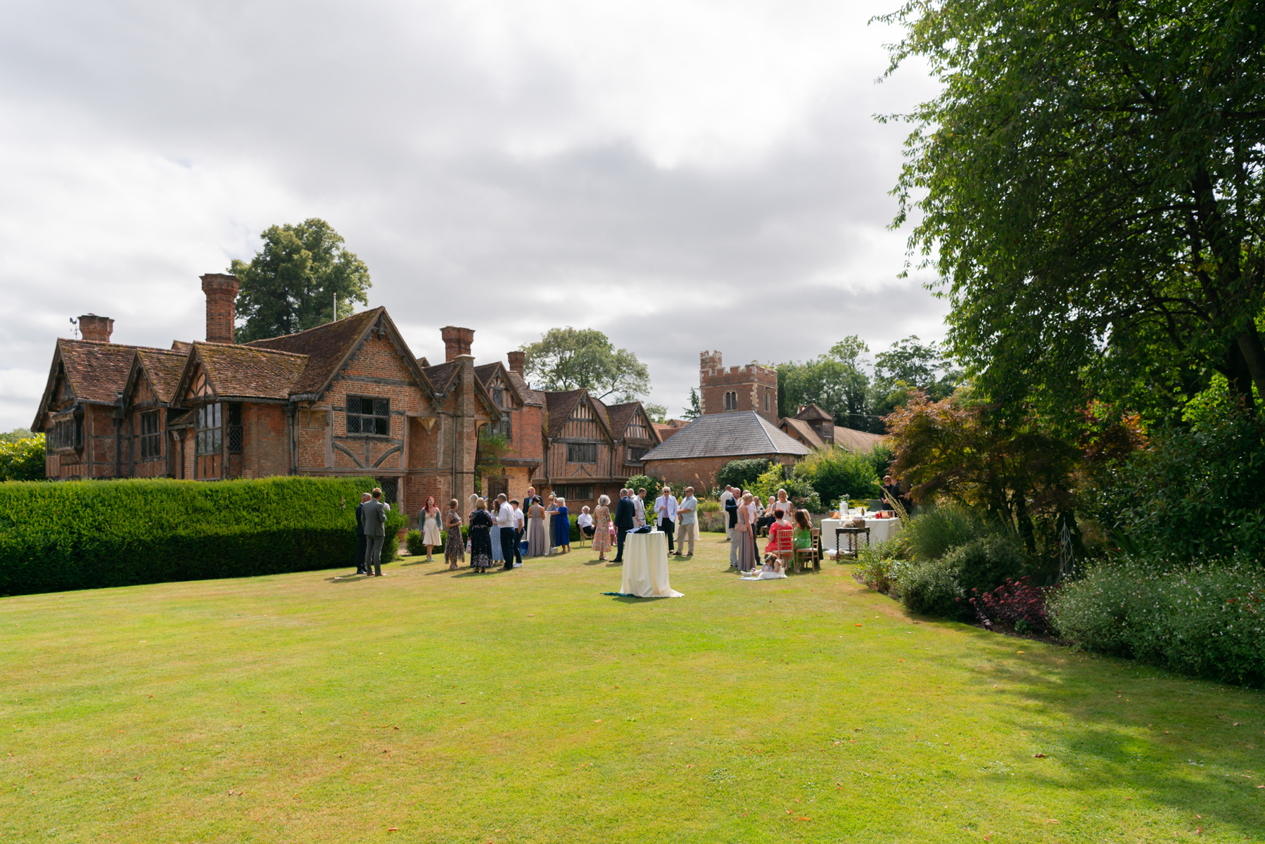 Wedding guests mingling at Dourney Court