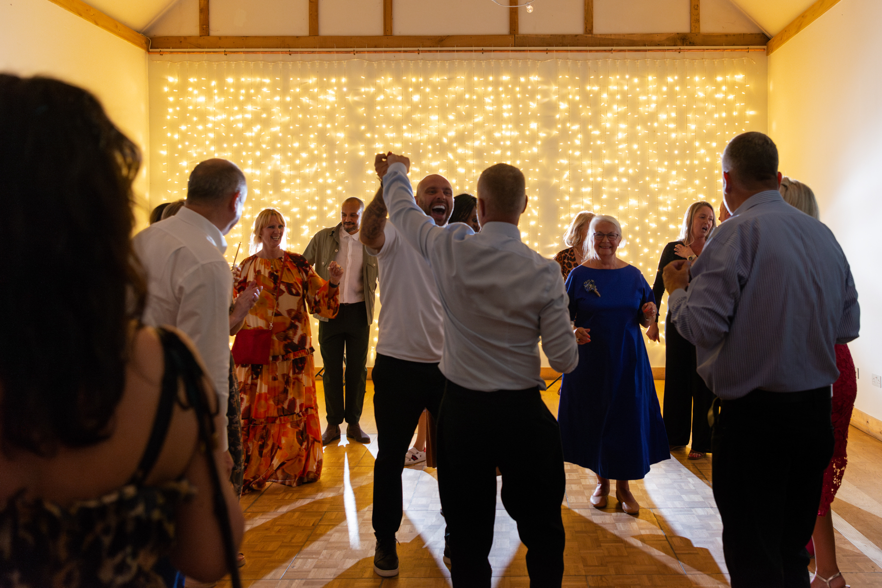 Dancing at Dourney Court wedding by Windsor Guildhall wedding photographer James Robertshaw