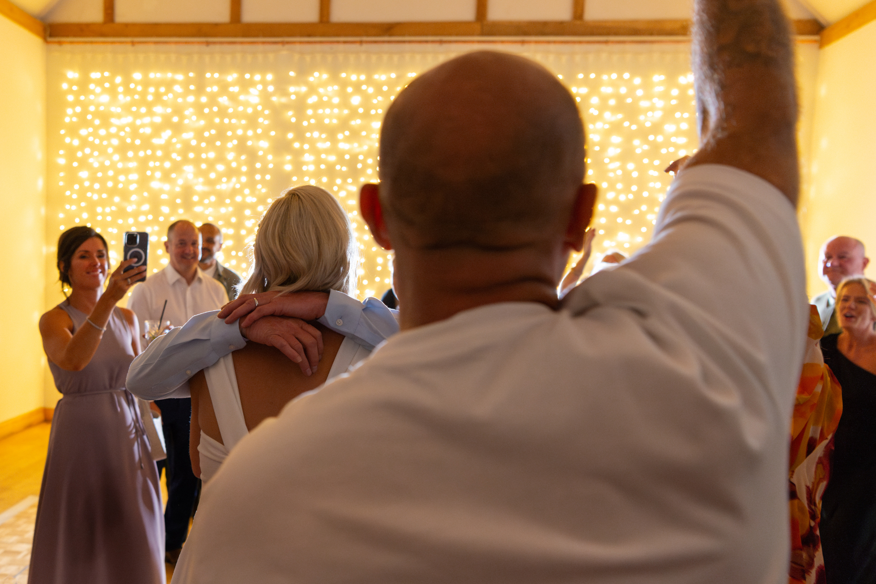Newlyweds on the dance floor at Dourney Court by Windsor Guildhall wedding photographer James Robertshaw